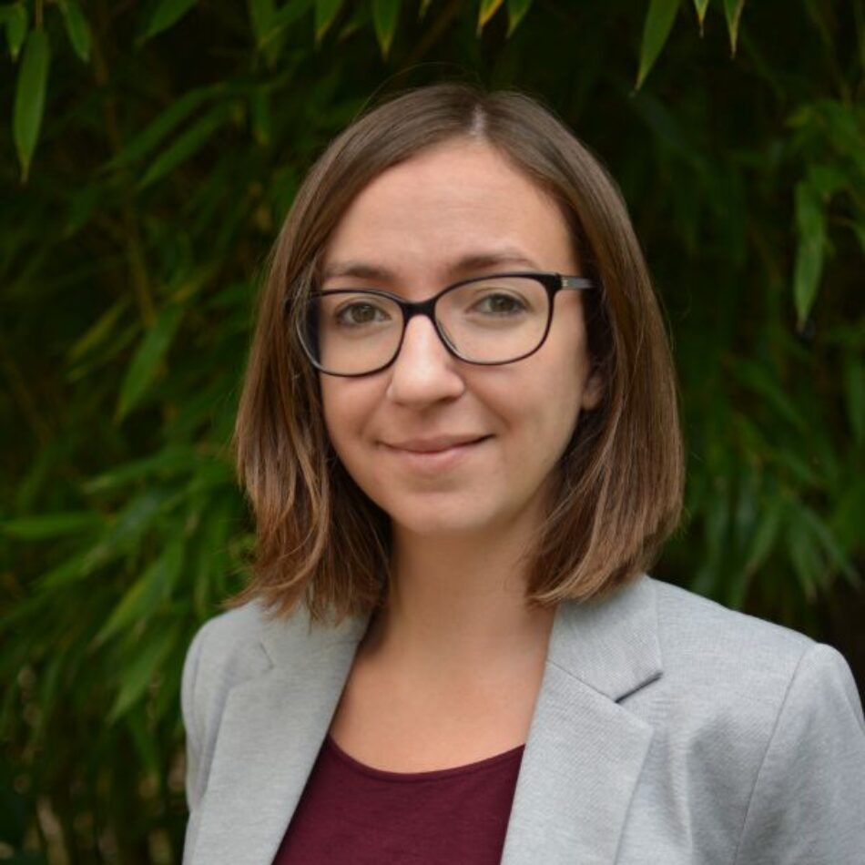 Profile photo of Celine against a green leafy background